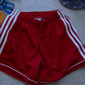 red adidas shorts